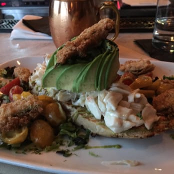 Cork & Cow - Avocado toast with crabmeat. Beautiful! Pair with a refreshing Garden Mule in a copper mug. - Steakhouses Near Me - Franklin, Tennessee Cork & Cow - Avocado toast with crabmeat. Beautiful! Pair with a refreshing Garden Mule in a copper mug. - Steakhouses Near Me - Franklin, Tennessee