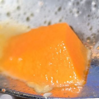 A Table Wayne's Kitchen - Piece of carrot I found under it all in the garlic tonkotsu braised beef ramen. - Asian Fusion Near Me - Manteca, California