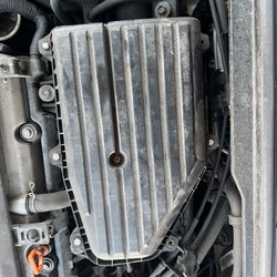 Take 5 Oil Change - Top left screw missing and top right screw missing.