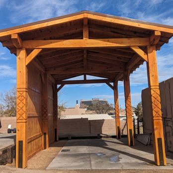 Fusion Concepts - RV Pergola w/ Custom Carved Columns, Gable Standing Seam Metal Roof. 14' Vertical Clearance, 21' wide, 40' deep, Solid Wall on West Side. - Patio Coverings Near Me Fusion Concepts - RV Pergola w/ Custom Carved Columns, Gable Standing Seam Metal Roof. 14' Vertical Clearance, 21' wide, 40' deep, Solid Wall on West Side. - Patio Coverings Near Me