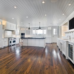 Reclaimed DesignWorks - This contemporary kitchen used our reclaimed oak flooring and it looks stunning!