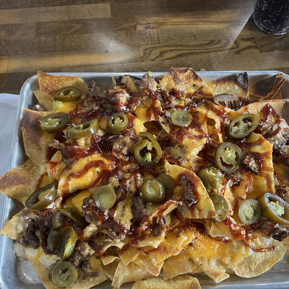Burgers Blues Barbecue - Brandon - Brisket nachos & a side of sour cream . Wow! Were they top notch ! Yummo ! - Burgers Near Me - Brandon, Mississippi
