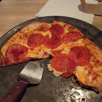 Two Cities Pizza - 12inch pepperoni pizza minus 2 slices. - Pizza Near Me - Suwanee, Georgia Two Cities Pizza - 12inch pepperoni pizza minus 2 slices. - Pizza Near Me - Suwanee, Georgia