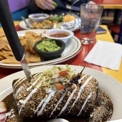 La Parrilla Kitchen - Spicy lamb burrito with mole sauce
