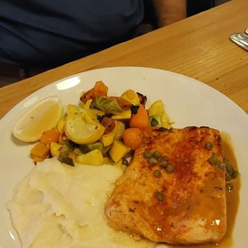 Poseidon Coastal Cuisine - East Coast style salmon, mashed potatoes and garlic butter veggies - Seafood Near Me - Hilton Head Island, South Carolina Poseidon Coastal Cuisine - East Coast style salmon, mashed potatoes and garlic butter veggies - Seafood Near Me - Hilton Head Island, South Carolina