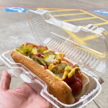 QuikTrip - a person holding a hot dog in a styrofoam container - Gas Stations Near Me - Plano, Texas QuikTrip - a person holding a hot dog in a styrofoam container - Gas Stations Near Me - Plano, Texas