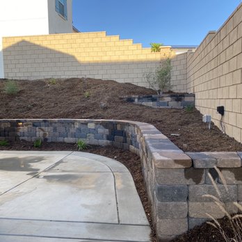 Prime Design Landscaping & Construction - We wanted the wall to prevent our dogs from going up the slope so Ernie brought it all the way around - Masonry/Concrete Near Me - Hemet, California Prime Design Landscaping & Construction - We wanted the wall to prevent our dogs from going up the slope so Ernie brought it all the way around - Masonry/Concrete Near Me - Hemet, California