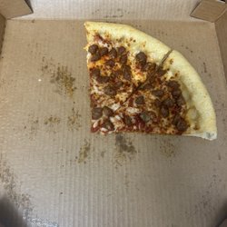 Pizza Hut - We tried to eat this one same as the other. Undercooked dough with barely any sauce, barely any cheese, and super dry.