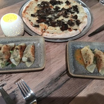 Moku Kitchen - Hamakua mushroom pizza, dimsum dish, potstickers - Cocktail Bars Near Me - Honolulu, Hawaii Moku Kitchen - Hamakua mushroom pizza, dimsum dish, potstickers - Cocktail Bars Near Me - Honolulu, Hawaii