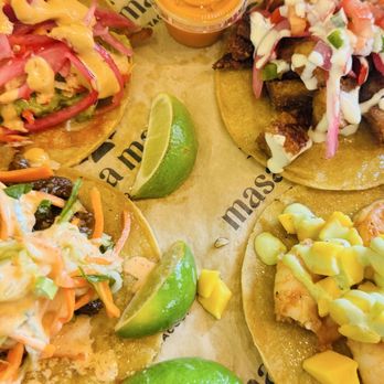 Masa Masa - Clockwise from top left: lobster, chicharrones, garlic shrimp, Korean bulgogi. - Tacos Near Me - Roseville, California Masa Masa - Clockwise from top left: lobster, chicharrones, garlic shrimp, Korean bulgogi. - Tacos Near Me - Roseville, California