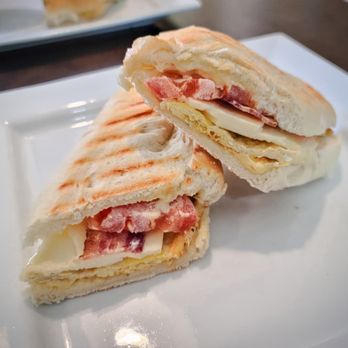Café Zezin - a sandwich cut in half on a plate - Cafes Near Me - Montreal, Quebec Café Zezin - a sandwich cut in half on a plate - Cafes Near Me - Montreal, Quebec
