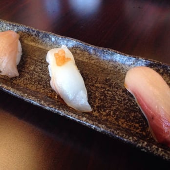 Shiro's - Premium Omakase part 1: white course, (left to right) albacore, white tuna, yellow tail - Sushi Bars Near Me - Seattle, Washington Shiro's - Premium Omakase part 1: white course, (left to right) albacore, white tuna, yellow tail - Sushi Bars Near Me - Seattle, Washington