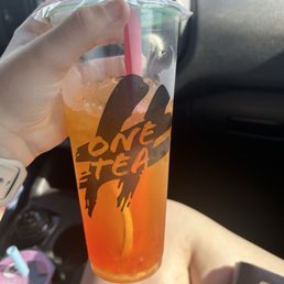 Passion fruit tea w/ strawberry popping boba