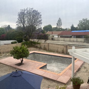 CATAK POOLS - The deck/coping poured/placed without disturbing the tree - Pool & Hot Tub Service Near Me - Simi Valley, California CATAK POOLS - The deck/coping poured/placed without disturbing the tree - Pool & Hot Tub Service Near Me - Simi Valley, California