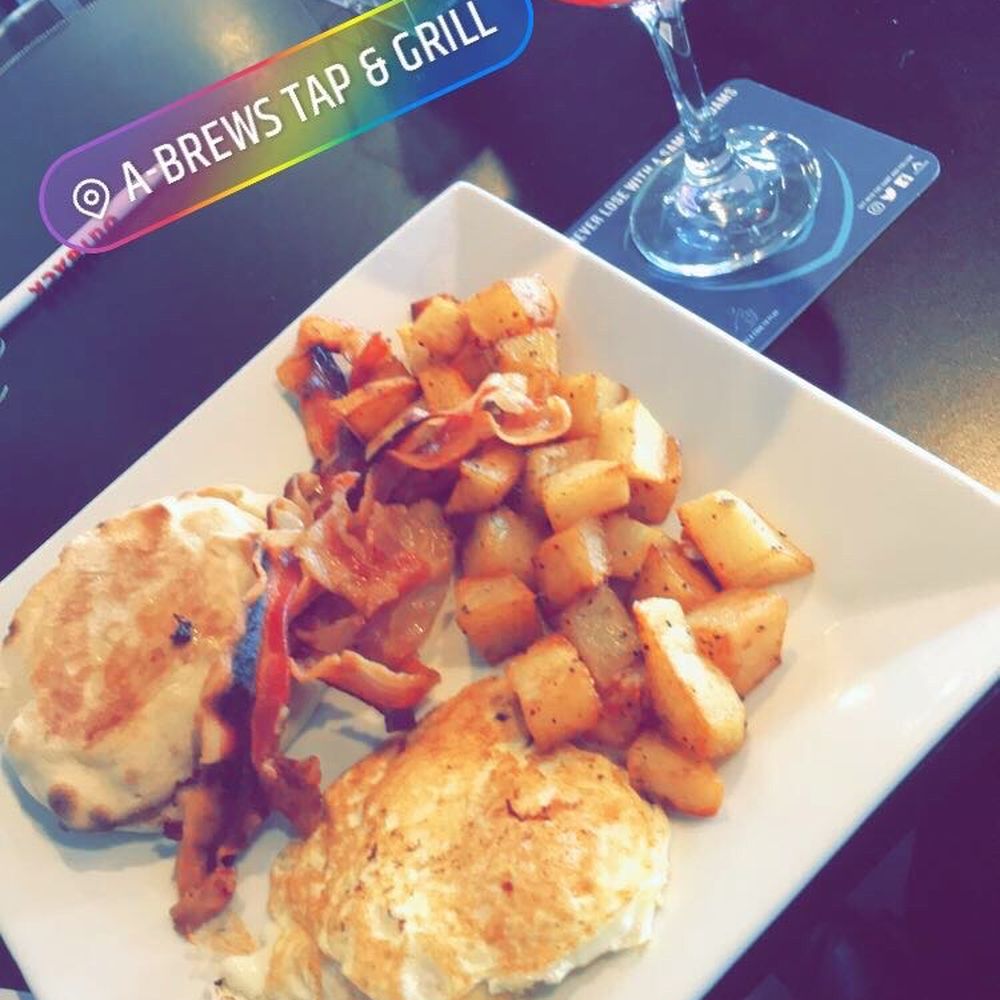 Strawberry mimosa & 2 eggs over easy, bacon, home fries and toast. Strawberry mimosa & 2 eggs over easy, bacon, home fries and toast.