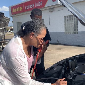 Take 5 Oil Change - My mother putting jumper cables on her car after paying the people at Chevron Xpress to help her with her car. - Oil Change Stations Near Me - Katy, Texas Take 5 Oil Change - My mother putting jumper cables on her car after paying the people at Chevron Xpress to help her with her car. - Oil Change Stations Near Me - Katy, Texas