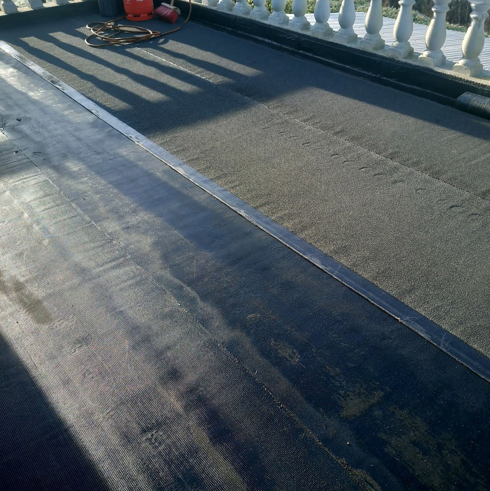 Slide of Pecan Park Roofing