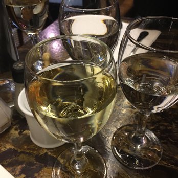 Le Plomb du Cantal - This is a little white wine to start.  We've already had a very decent French onion soup.  We are super excited to eat the rest! - French Near Me - Paris, 75