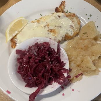 Das Schnitzel Haus - Käse Schnitzel (chicken) with red cabbage and German potato salad - German Near Me - Parma, Ohio