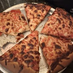 Top of burnt pizza Top of burnt pizza