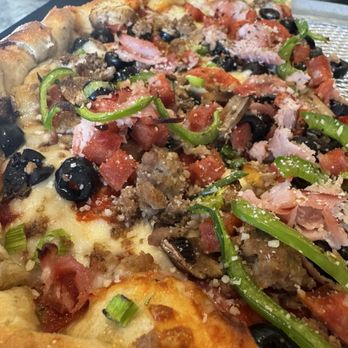 Brick Oven Pizza - Signature "everything" pizza. Tons of toppings. Tons of flavor - Pizza Near Me - Kapolei, Hawaii Brick Oven Pizza - Signature "everything" pizza. Tons of toppings. Tons of flavor - Pizza Near Me - Kapolei, Hawaii