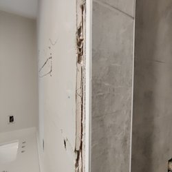 Diaz Tile - Didn't bring the tile to the edge so now sheetrock is exposed