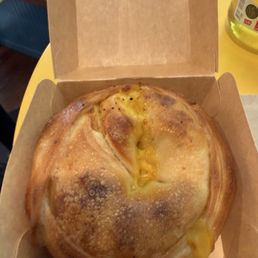 Stuffed egg and cheese bagel. Stuffed egg and cheese bagel.