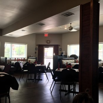 Bellissimo - a dining room with tables and chairs - Italian Near Me - Houston, Texas Bellissimo - a dining room with tables and chairs - Italian Near Me - Houston, Texas