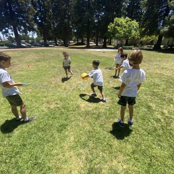 Camp Captivate - Kicking around a ball outside in the sunshine - Summer Camps Near Me - Santa Clara, California