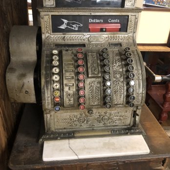 The Old Village Store - Old fashioned cash register that was inside the store - Grocery Near Me - West Barnstable, Massachusetts The Old Village Store - Old fashioned cash register that was inside the store - Grocery Near Me - West Barnstable, Massachusetts