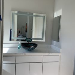 Diversified Improvements - installed and fabricated counters sink new light up mirror