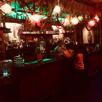 Pagan Idol - Back bar with intimate seating and small huts to drink inside. - Tiki Bars Near Me - San Francisco, California Pagan Idol - Back bar with intimate seating and small huts to drink inside. - Tiki Bars Near Me - San Francisco, California