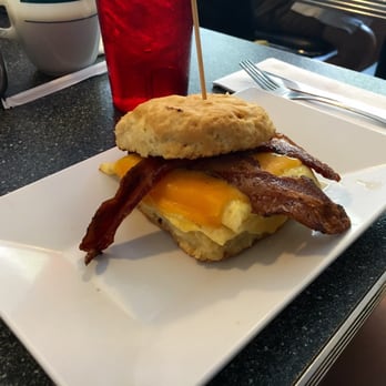 The Blue Hen Cafe - Breakfast sandwich on a biscuit with added bacon (bacon is an extra charge) - Southern Near Me - Saint Augustine, Florida