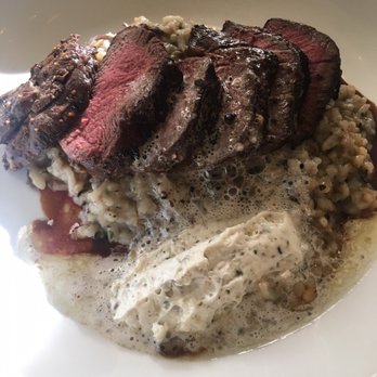 Halls Chophouse - Bison with mushroom risotto. So tender and flavorful! - Steakhouses Near Me - Charleston, South Carolina
