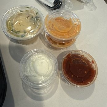 Olive Tree Mediterranean - Hummus, garlic sauce, spicy garlic sauce, and chili sauce - Mediterranean Near Me - Fresno, California Olive Tree Mediterranean - Hummus, garlic sauce, spicy garlic sauce, and chili sauce - Mediterranean Near Me - Fresno, California