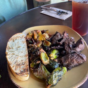 Urban Plates - Grilled Grass Fed Steak with Brussel sprouts and beets and carrots, iced tea. - Salad Near Me - Pasadena, California
