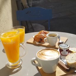 Breakfast time. Flat white and espresso with a croissant. Breakfast time. Flat white and espresso with a croissant.