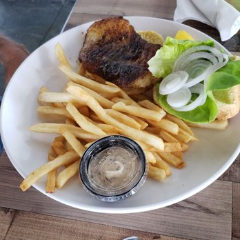 Waterfront Social - This was a fish sandwich but i don't remember what type of fish. Sorry. - Bars Near Me - Crystal River, Florida Waterfront Social - This was a fish sandwich but i don't remember what type of fish. Sorry. - Bars Near Me - Crystal River, Florida