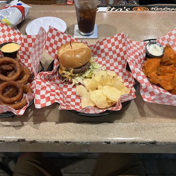 Fast Eddies - Happy hour specials. Smashburger, wings and a side of onion rings. - New American Near Me - Ocean City, Maryland Fast Eddies - Happy hour specials. Smashburger, wings and a side of onion rings. - New American Near Me - Ocean City, Maryland