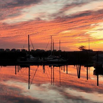 Ocean Suites - Sunset in October. Marina is just a short walk from Ocean Suites. - Hotels Near Me - Brookings, Oregon