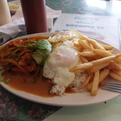 Churrasco.  Steak and eggs with fries and rice. $10