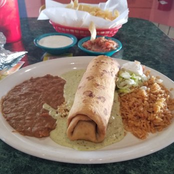 Chuy's - Chuychanga with Deluxe Tomatillo Sauce - Mexican Near Me - San Antonio, Texas