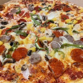 Backstreet Pizza - A supreme 16" pizza with olives on the side and pineapple on top (extra $3) - Pizza Near Me - Oviedo, Florida Backstreet Pizza - A supreme 16" pizza with olives on the side and pineapple on top (extra $3) - Pizza Near Me - Oviedo, Florida