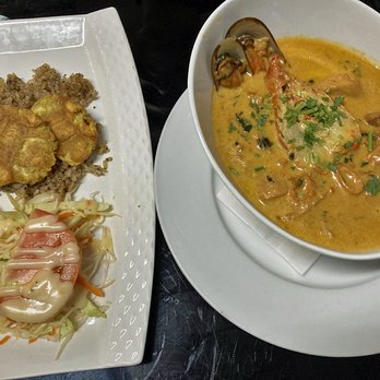 Esto Es Colombia - Cazuela de Mariscos (seafood soup with coconut rice, plantain, and salad) - Colombian Near Me - Toronto, Ontario Esto Es Colombia - Cazuela de Mariscos (seafood soup with coconut rice, plantain, and salad) - Colombian Near Me - Toronto, Ontario