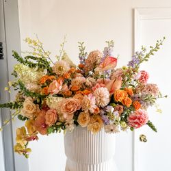 Kissed By Tulips - Statement floral arrangement featuring orchids, anthurium, roses, dahlias, hybrid delphiniums, panicle hydrangeas, foxglove and ranunculus.