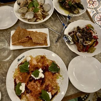 Marisi - Tomato Carpaccio, peppers, eggplant and seafood pasta - Italian Near Me - La Jolla, California Marisi - Tomato Carpaccio, peppers, eggplant and seafood pasta - Italian Near Me - La Jolla, California