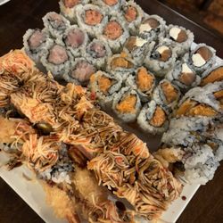Sushi Palace - Somerville - [clockwise from top left] spicy tuna; philadelphia, sweet potato; jersey girl; edison; yellowtail; spicy salmon