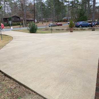 Home Town Exteriors - a driveway with a brick wall - Gutter Services Near Me Home Town Exteriors - a driveway with a brick wall - Gutter Services Near Me
