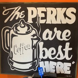 Buy The Cup - One of the endearing signs in the shop :)