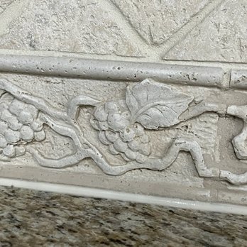 The Grout Doctor-St. Charles - Color is off and spread all over the stone. - Grout Services Near Me The Grout Doctor-St. Charles - Color is off and spread all over the stone. - Grout Services Near Me